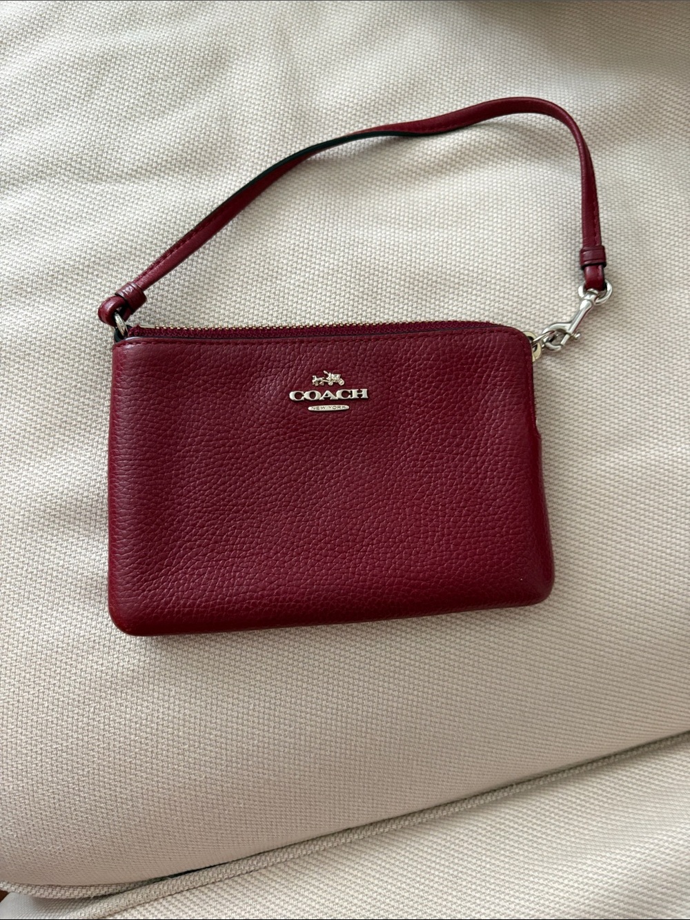 COACH Pebbled Leather Wristlet in Wine Red